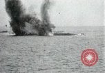 Image of Japanese ships being hit by United States cruisers Japan, 1946, second 25 stock footage video 65675022273