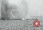 Image of Japanese ships being hit by United States cruisers Japan, 1946, second 29 stock footage video 65675022273