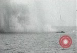 Image of Japanese ships being hit by United States cruisers Japan, 1946, second 30 stock footage video 65675022273
