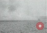 Image of Japanese ships being hit by United States cruisers Japan, 1946, second 34 stock footage video 65675022273