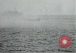 Image of Japanese ships being hit by United States cruisers Japan, 1946, second 38 stock footage video 65675022273
