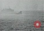 Image of Japanese ships being hit by United States cruisers Japan, 1946, second 40 stock footage video 65675022273