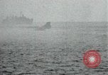 Image of Japanese ships being hit by United States cruisers Japan, 1946, second 41 stock footage video 65675022273