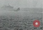 Image of Japanese ships being hit by United States cruisers Japan, 1946, second 42 stock footage video 65675022273