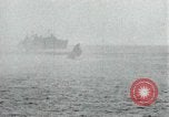 Image of Japanese ships being hit by United States cruisers Japan, 1946, second 45 stock footage video 65675022273