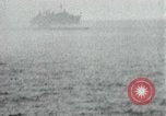 Image of Japanese ships being hit by United States cruisers Japan, 1946, second 49 stock footage video 65675022273