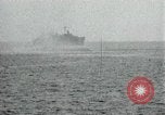 Image of Japanese ships being hit by United States cruisers Japan, 1946, second 52 stock footage video 65675022273