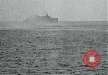 Image of Japanese ships being hit by United States cruisers Japan, 1946, second 55 stock footage video 65675022273