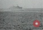 Image of Japanese ships being hit by United States cruisers Japan, 1946, second 56 stock footage video 65675022273