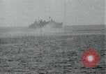 Image of Japanese ships being hit by United States cruisers Japan, 1946, second 59 stock footage video 65675022273