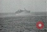 Image of Japanese ships being hit by United States cruisers Japan, 1946, second 60 stock footage video 65675022273