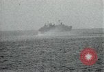 Image of Japanese ships being hit by United States cruisers Japan, 1946, second 61 stock footage video 65675022273