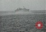Image of Japanese ships being hit by United States cruisers Japan, 1946, second 62 stock footage video 65675022273