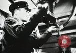 Image of Officers inside Japanese two-man midget submarine Pacific Theater, 1941, second 8 stock footage video 65675022276