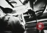 Image of Officers inside Japanese two-man midget submarine Pacific Theater, 1941, second 10 stock footage video 65675022276