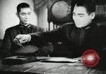 Standbild Japanische Marine Personal bereiten Angriff auf Pearl Habor Pacific Theater, 1941, aus Sekunde 61 historischem Filmmaterial Videoclip 65675022278