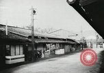 Image of Japanese citizens listen to radio Japan, 1941, second 17 stock footage video 65675022280