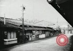 Image of Japanese citizens listen to radio Japan, 1941, second 18 stock footage video 65675022280
