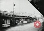 Image of Japanese citizens listen to radio Japan, 1941, second 19 stock footage video 65675022280