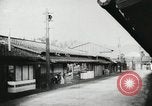 Image of Japanese citizens listen to radio Japan, 1941, second 21 stock footage video 65675022280
