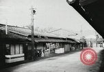 Image of Japanese citizens listen to radio Japan, 1941, second 22 stock footage video 65675022280