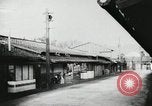 Image of Japanese citizens listen to radio Japan, 1941, second 23 stock footage video 65675022280