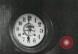 Image of Japanese citizens listen to radio Japan, 1941, second 32 stock footage video 65675022280
