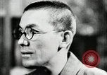 Image of Japanese citizens listen to radio Japan, 1941, second 35 stock footage video 65675022280
