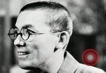 Image of Japanese citizens listen to radio Japan, 1941, second 37 stock footage video 65675022280