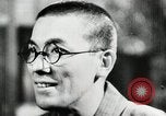 Image of Japanese citizens listen to radio Japan, 1941, second 38 stock footage video 65675022280