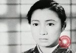 Image of Japanese citizens listen to radio Japan, 1941, second 43 stock footage video 65675022280