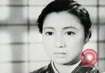 Image of Japanese citizens listen to radio Japan, 1941, second 44 stock footage video 65675022280