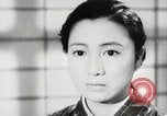 Image of Japanese citizens listen to radio Japan, 1941, second 45 stock footage video 65675022280