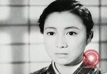 Image of Japanese citizens listen to radio Japan, 1941, second 46 stock footage video 65675022280