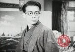 Image of Japanese citizens listen to radio Japan, 1941, second 48 stock footage video 65675022280