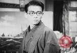 Image of Japanese citizens listen to radio Japan, 1941, second 49 stock footage video 65675022280