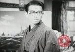 Image of Japanese citizens listen to radio Japan, 1941, second 50 stock footage video 65675022280