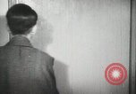 Image of Japanese citizens listen to radio Japan, 1941, second 52 stock footage video 65675022280