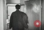 Image of Japanese citizens listen to radio Japan, 1941, second 53 stock footage video 65675022280