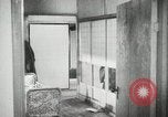 Image of Japanese citizens listen to radio Japan, 1941, second 55 stock footage video 65675022280