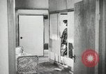 Image of Japanese citizens listen to radio Japan, 1941, second 56 stock footage video 65675022280