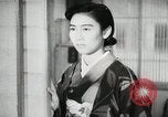 Image of Japanese citizens listen to radio Japan, 1941, second 58 stock footage video 65675022280