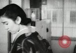 Image of Japanese citizens listen to radio Japan, 1941, second 59 stock footage video 65675022280