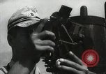 Standbild Offiziere auf Japanischen Uboot plot Position und Navigieren Indischer Ozean, 1942, aus Sekunde 14 historischem Filmmaterial Videoclip 65675022283