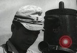Standbild Offiziere auf Japanischen Uboot plot Position und Navigieren Indischer Ozean, 1942, aus Sekunde 16 historischem Filmmaterial Videoclip 65675022283
