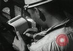 Standbild Offiziere auf Japanischen Uboot plot Position und Navigieren Indischer Ozean, 1942, aus Sekunde 32 historischem Filmmaterial Videoclip 65675022283