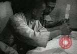 Standbild Offiziere auf Japanischen Uboot plot Position und Navigieren Indischer Ozean, 1942, aus Sekunde 41 historischem Filmmaterial Videoclip 65675022283