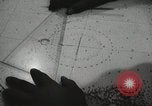 Standbild Offiziere auf Japanischen Uboot plot Position und Navigieren Indischer Ozean, 1942, aus Sekunde 44 historischem Filmmaterial Videoclip 65675022283