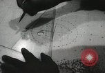 Standbild Offiziere auf Japanischen Uboot plot Position und Navigieren Indischer Ozean, 1942, aus Sekunde 48 historischem Filmmaterial Videoclip 65675022283