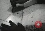 Standbild Offiziere auf Japanischen Uboot plot Position und Navigieren Indischer Ozean, 1942, aus Sekunde 49 historischem Filmmaterial Videoclip 65675022283